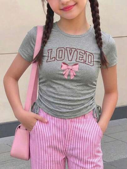Camiseta de manga corta con cuello redondo, ajustada y con pliegues laterales para niñas y preadolescentes