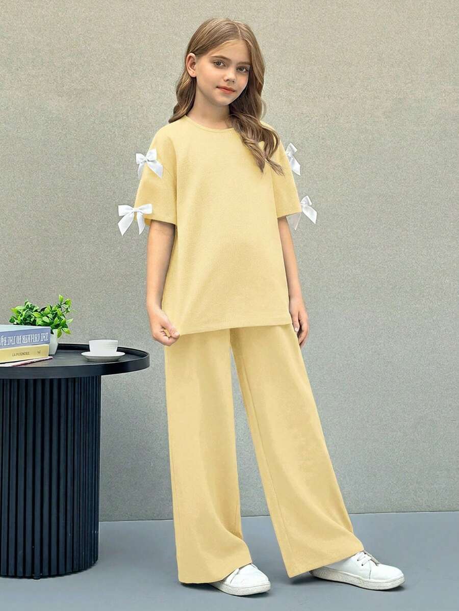 SHEIN Nova Glow 少女纯色圆领蝴蝶结宽松T恤和宽松长裤两件套休闲套装 - 黃色 - 查看 1
