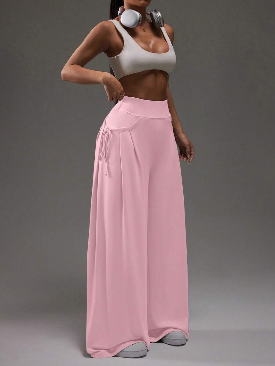 Dewbera Dewbera Pantalones deportivos casuales de malla con pliegues para mujer, adecuados para primavera y otoño - Rosa Pálido - Ver 1