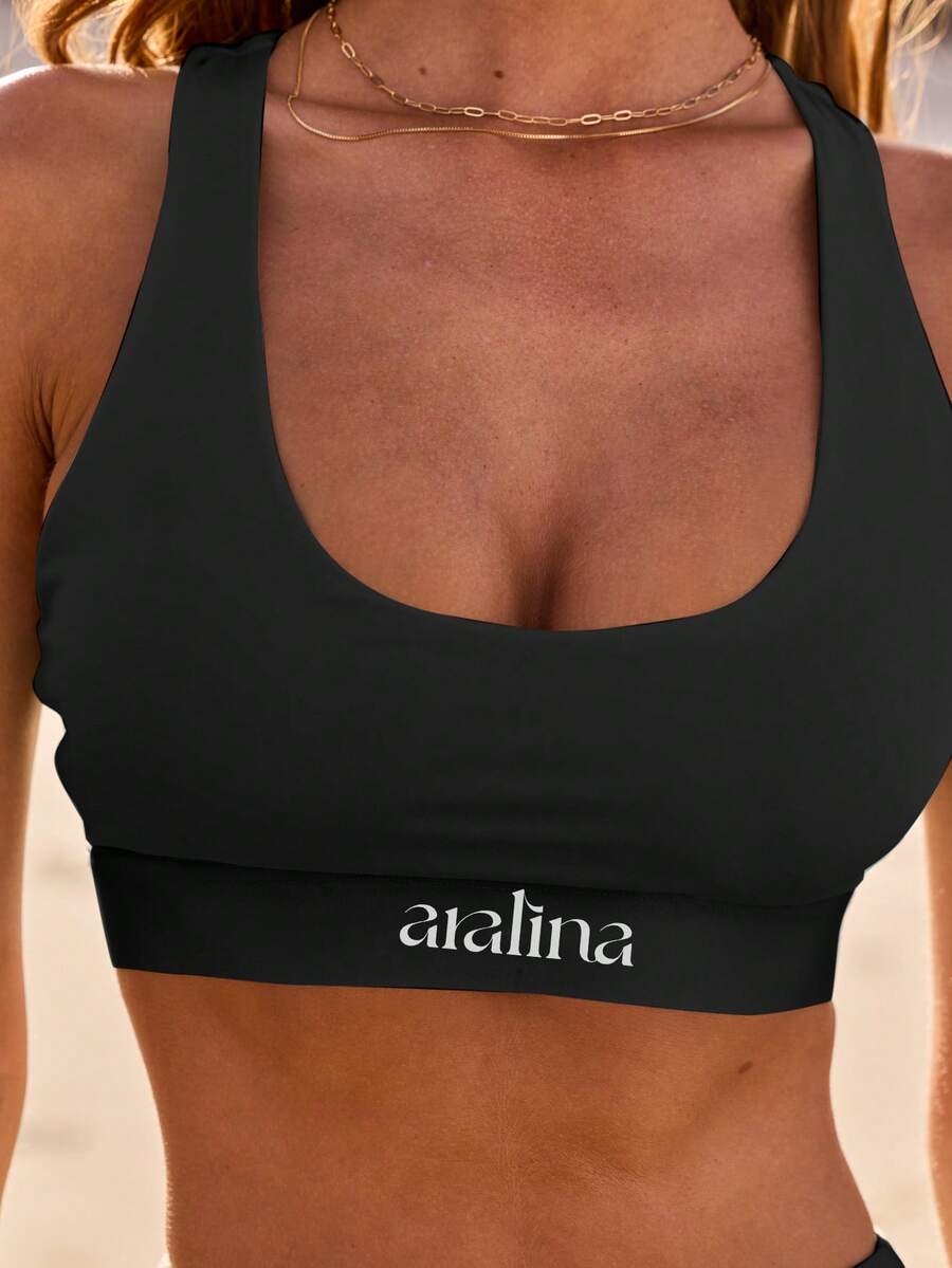 Aralina Áo croptop thể thao năng động mùa xuân hè, kiểu dáng racer back, có túi đựng điện thoại. - màu đen - Xem 1