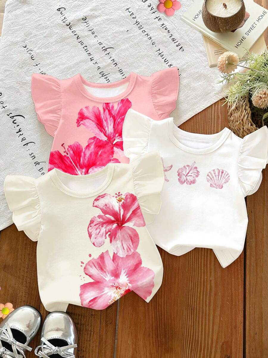 女嬰夏季限量版甜美活潑短袖花卉印花上衣,3款可搭配不同喜好:柔粉底色漸層木槿花印花、象牙白底層疊木槿花印花、象牙白底粉色海星木槿花與貝殼印花,經典圓領荷葉邊袖,透氣面料適合夏季穿著,適用日常、外出與居家休閒 - 彩色 - 查看 1
