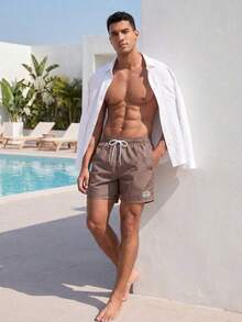 CoralVoy Men's Summer Beach Vacation Style All-Over Letter Print Drawstring Waist Slant Pocket Beach Shorts, Holiday - Brown - View 4