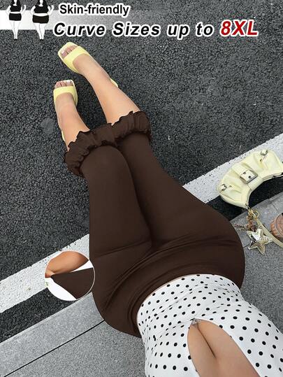 SHEIN CURVE+ Quần legging lửng 7/8 màu trơn có bèo nhún dành cho nữ cỡ lớn.