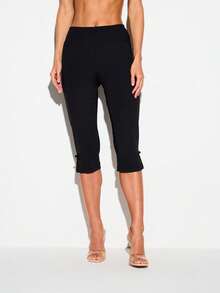 KIZN Quần legging lửng (capri) với chi tiết khóa hình ếch, eo chun, chiều dài lửng, xẻ tà bên hông, phong cách thường ngày năng động. - màu đen - Xem 1