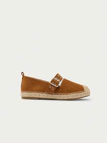 Nöista Une sandale plate de style espadrille beige, avec une bride à boucle marquante et une semelle enveloppée de jute pour un look décontracté et estival. - Kaki - Voir 1