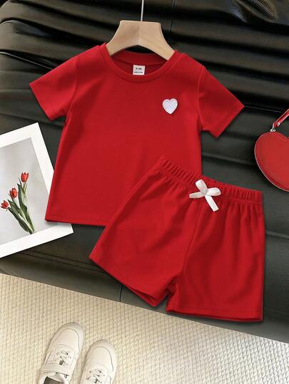 2pcs Young Girls Summer Soft & Cute Red Waffle Texture Breathable Fabric Heart Embroidery Short Sleeve T-Shirt And Bow Elastic Waist Sports Shorts Set, Left Chest White Heart Embroidery + All-Over Subtle Plaid Texture Showcasing Quality, Suitable For Daily Outings, Celebrations, Birthday Parties, Festivals, Vacations, Back To School