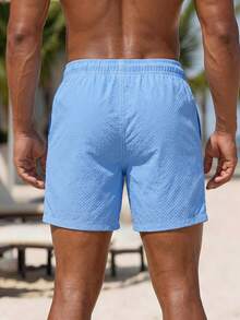 Manfinity KASUA Pantalones cortos de playa para hombre de unicolor con textura y cordón en la cintura, para vacaciones de verano - Azul - Ver 2