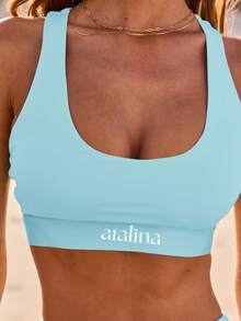 Aralina Leisurewear Active Spring Summer Crop Exercise Racer Back Top With Phone Pocket Insert - Aqua Blue - View 1