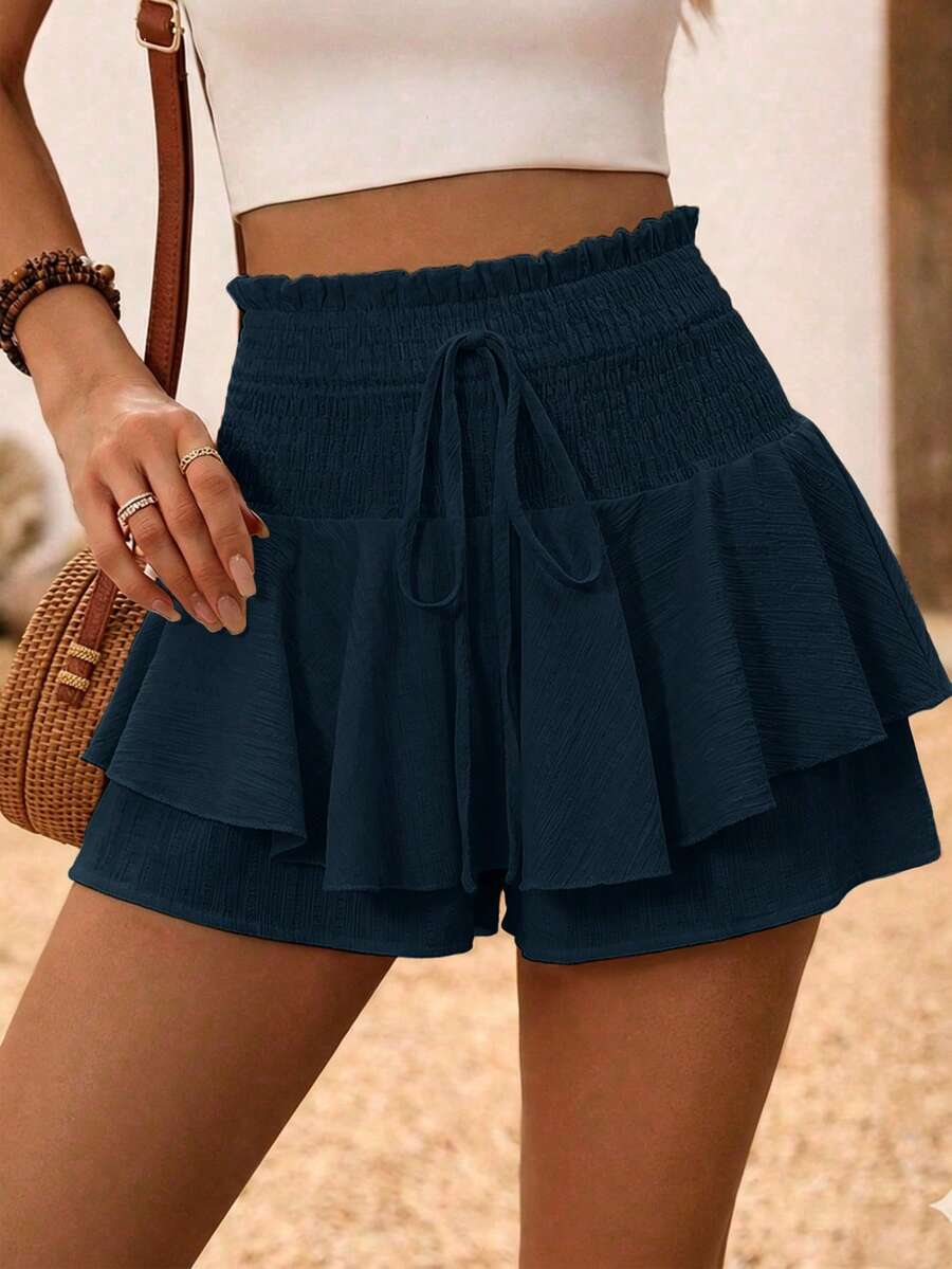 Selianne Short décontracté femme à double couche asymétrique avec volant, texture ondulée en tissu blanc, avec ceinture à la taille. Convient pour Pâques, Fête du Travail, anniversaire, vacances, plage, printemps et été - Bleu marine - Voir 1