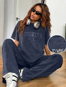 SHEIN EZwear Bộ 2 món áo thun và quần dài nữ cỡ lớn màu đen và xanh navy in chữ nổi. - Màu xanh hải quân - Xem 1