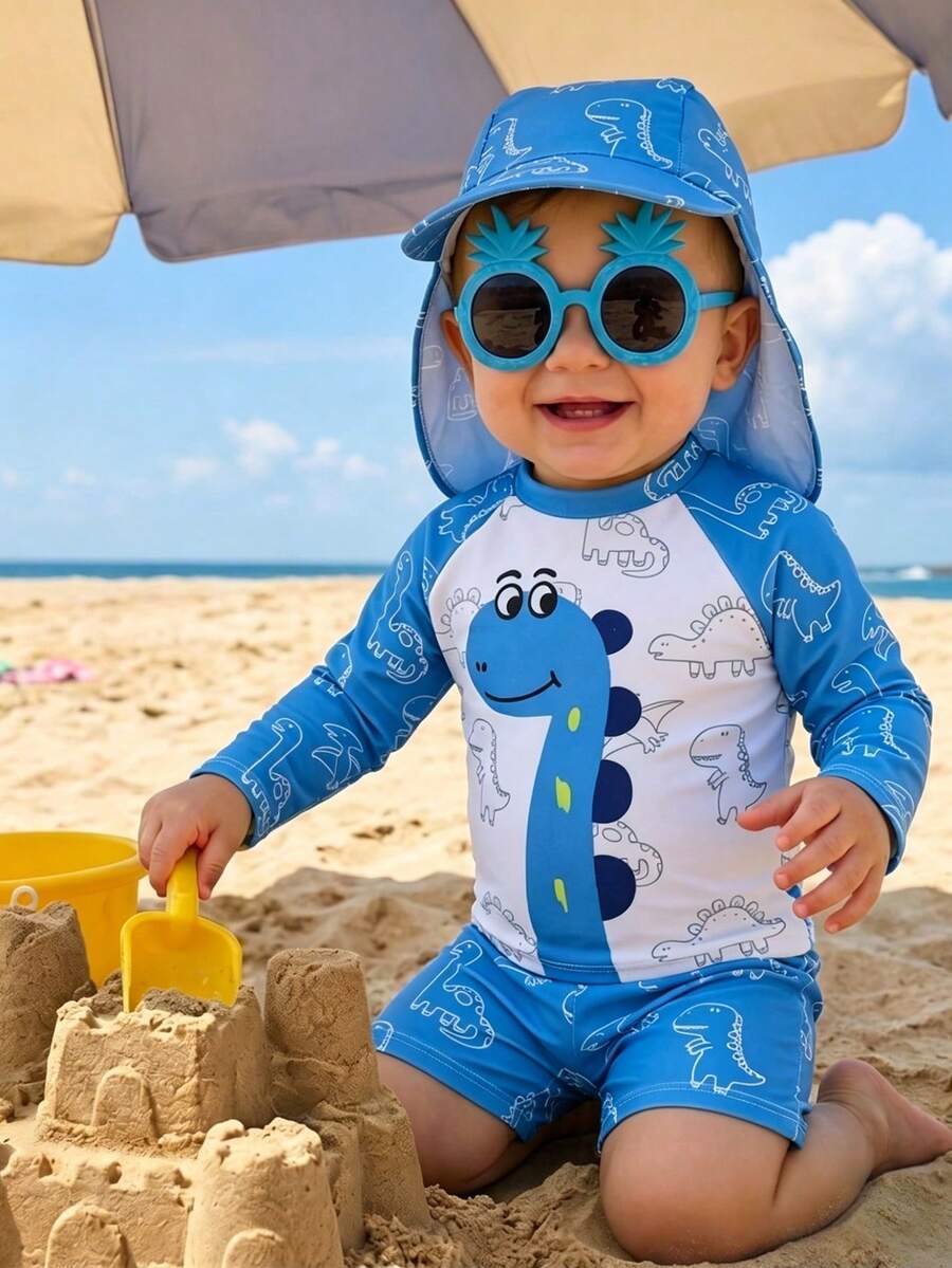 SHEIN Conjunto de 3 piezas para bebé unisex: Bañador de manga larga con protección solar y estampado de dinosaurio azul lindo + Gorro protector, traje de baño para playa, natación, vacaciones - Multicolor - Ver 1