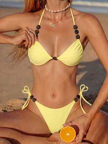 Bonvoyette Bộ bikini hai mảnh màu vàng chanh, dây buộc cổ tam giác và hạt nhựa màu nâu không đều, kiểu dáng gợi cảm, buộc dây bên hông, thích hợp cho kỳ nghỉ của phụ nữ. - Màu vàng - Xem 1