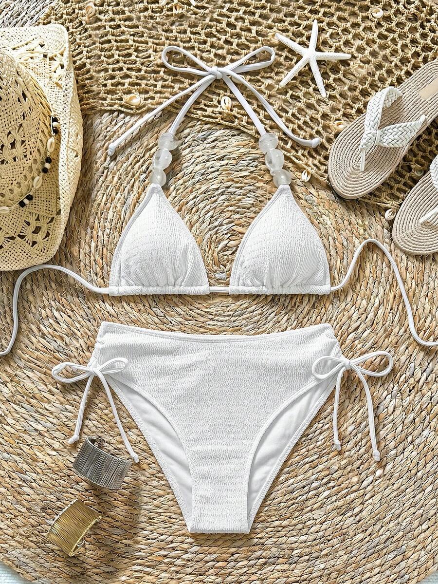 Soleia Bộ bikini nữ màu trơn đính hạt cườm, kiểu cổ yếm, hở lưng, buộc dây phía trước.
