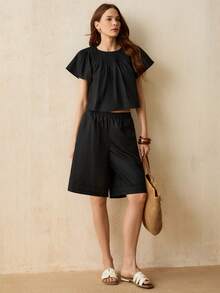 SURIMA Women's Solid Color Short Sleeve Round Neck Fitted Top - Black - View 6