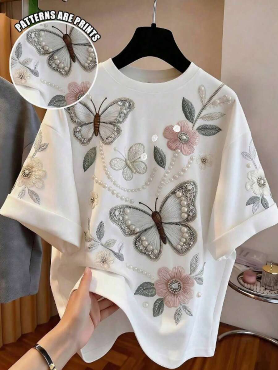 SHEIN Essnce 休閒復古優雅通勤百搭保暖蝴蝶珍珠刺繡印花圖案,適合海灘、度假、女性夏季,寬鬆圓領短袖T恤 - 彩色 - 查看 1