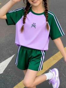 SHEIN Bộ đồ 2 mảnh Casuvi Kids dành cho bé gái: Áo thun dệt kim kết hợp với quần short dệt kim kiểu dáng thường ngày, họa tiết nơ hoạt hình, sọc bên hông tương phản, phong cách thường ngày kiểu Mỹ, phù hợp cho trang phục hàng ngày và kỳ nghỉ xuân/hè. - Màu Lilac Tím - Xem 3