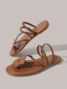 Styleloop Giày nữ màu nâu đan dây có hoa, sandal La Mã đế bệt cho mùa hè và đi du lịch - màu nâu - Xem 1