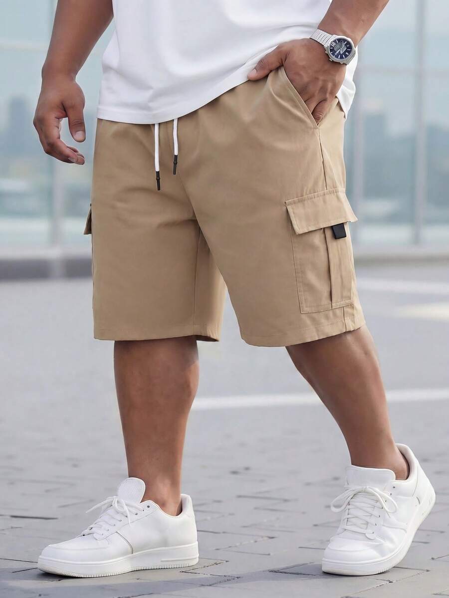 Manfinity Homme 大码男士工装短裤,适合通勤、旅行、休闲、周末郊游、户外活动和探险。这款百搭短裤是男士衣橱必备单品,也是送给男友或丈夫的绝佳礼物。 - 卡其色 - 查看 1