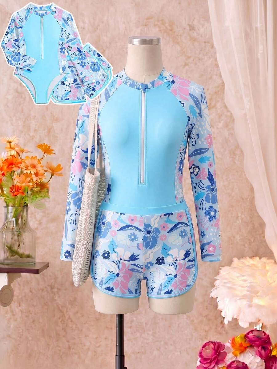 SHEIN 少女连体泳衣(含短裤),少女长袖拉链泳衣套装(两件套),适合春夏海滩游泳。紫色拼接花卉印花图案,时尚设计。面料舒适、清新、时尚。 - 藍色 - 查看 1