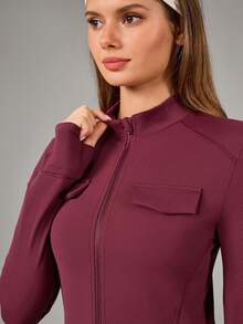 OutZeal Chaqueta deportiva para mujer, chaqueta con cremallera ajustada y de secado rápido para gimnasio y entrenamiento, con múltiples bolsillos - Burdeos - Ver 7