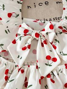 SHEIN LMoss Kids 兒童 LMoss 女孩可愛櫻桃印花短袖上衣 & 短褲套裝，適合幼兒在春季、夏季、秋季穿著，上衣背面有蝴蝶結設計，年輕女孩休閒度假風格，女孩紅色 2 件套裝，女孩優雅長褲套裝，女孩可愛櫻桃印花長褲 - 白色 - 查看 9