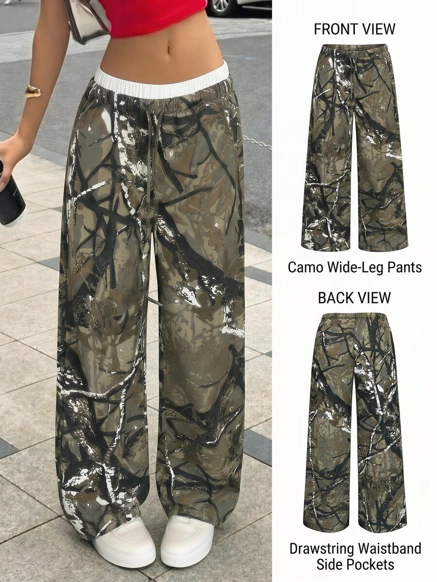 SHEIN Quần jeans ống rộng kẻ sọc phong cách Y2K dành cho nữ tuổi teen, kiểu dáng thường ngày, với cạp quần tương phản và thiết kế 2 trong 1. Phong cách Y2K thường ngày, thoải mái và sành điệu, phù hợp cho mùa xuân và mùa hè, thanh lịch và trang phục đi nghỉ mát, nghỉ xuân hè, đi biển. Thoải mái và sành điệu, phong cách thường ngày và đường phố, mùa hè, phù hợp cho mùa xuân và mùa hè, thanh lịch và trang phục đi nghỉ mát, nghỉ xuân hè, đi biển, lễ hội, tiệc tùng, đám cưới, lễ tốt nghiệp, dạ hội, sinh nhật, kỳ nghỉ thường ngày. - Nhiều màu - Xem 1