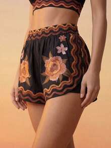 CAJUNI Quần short thể thao nữ in họa tiết hoa - màu đen - Xem 8
