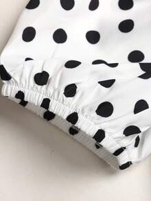 SHEIN LMoss Kids Tween Girl Casual Elegant Commuter Vintage Black & White Polka Dot Contrast Color Large Bow Round Neck Blue Puff Sleeve Front Center Black Bow Top & Straight Leg Long Pants Set, Tween Girl Outfit 2pcs - Black and White - View 6
