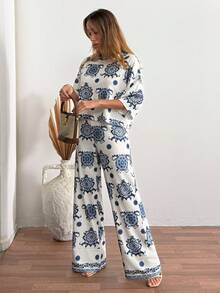 Cloudara Bộ đồ hai mảnh in họa tiết Boho màu xanh dương dành cho nữ – Áo tay ngắn và quần ống rộng cạp cao, bộ đồ mùa hè thanh lịch, trang phục đi biển thoải mái, bộ đồ mặc nhà in họa tiết nhẹ nhàng, bộ đồ đồng bộ cho kỳ nghỉ. - Xanh và trắng - Xem 6