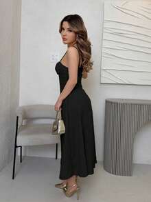 Women's Dress With X-Shaped Straps In A Single Color - Hitam - View 6