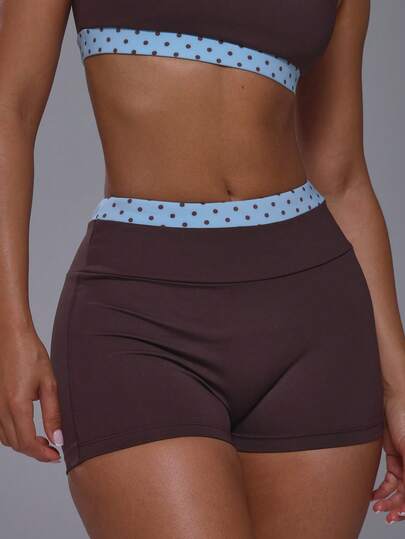 Musera Sport Short mini ajusté à motif de pois bleu bicolore. Bas de tenue de sport, entraînement, gym, pilates, fitness, usage quotidien