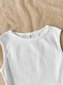 SHEIN Bộ 2 món cho bé gái tuổi teen: áo vest cổ chéo sọc màu trơn và chân váy bánh kem cạp cao họa tiết hoa, phong cách dễ thương độc đáo, phù hợp đi du lịch, lễ hội âm nhạc, tựu trường, tiệc trưa và trà chiều sân vườn mùa xuân - Nhiều màu - Xem 5