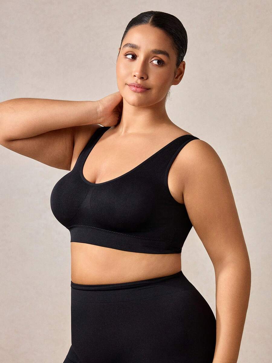 Veilyse 1 pieza Sujetador deportivo sin costuras de doble capa y unicolor para mujer de talla grande, ropa interior de yoga y fitness cómoda y inalámbrica (con almohadillas no fijas desmontables) - Negro - Ver 1