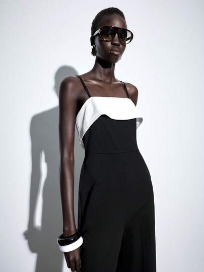 Lumivelle Bộ jumpsuit nữ không tay, phối màu tương phản, có bèo nhún ở gấu, dáng ôm, thích hợp cho đi làm, đi chơi, đi nghỉ mát; jumpsuit không dây, jumpsuit hai dây, jumpsuit ôm, jumpsuit phối màu tương phản, jumpsuit đi làm và đi chơi