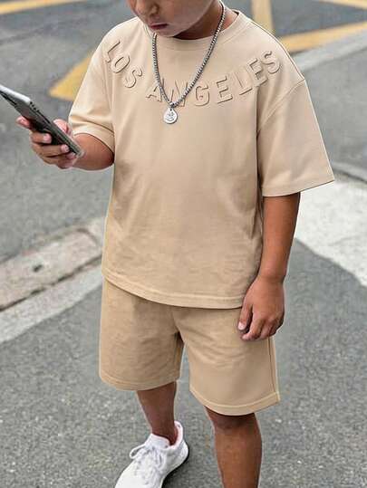 SHEIN 青少年男童字母印花水洗短袖T恤，休闲、舒适、时尚、百搭、可爱、柔软，适合日常穿着、上学、外出、运动、节日和派对。