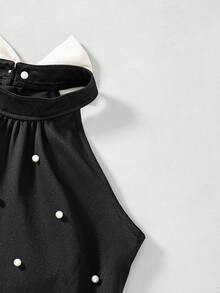 Elladie kids 一件优雅的少女黑色吊带连衣裙，白色荷叶边下摆，点缀珍珠，轻盈的雪纺A字廓形，腰部柔软的褶裥设计，适合生日派对、婚礼、学校活动、家庭聚会、早午餐约会、城市庆典和派对等场合。 - 黑色 - 查看 5