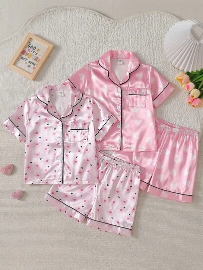 SHEIN 4-Piece Girls Toddler Lapel Collar Short Sleeve And Shorts Summer Set Featuring Pink Floral And Heart Pattern Print Pajamas Homewear Sleepwear Silky Smooth Satin Fabric Cute Comfy Cozy Casual Matching Outfit Breathable Lightweight Chic Elegant Stylish Every Day Night Wear Soft Skin Friendly High Quality Material
