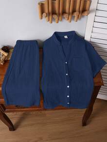 SHEIN Bộ 2 món cho bé trai tuổi teen, gồm áo khoác cardigan cổ tròn tay ngắn và quần short cạp chun, thích hợp đi làm, đi học, đi chơi, chơi thể thao, mùa xuân/hè. - Màu xanh hải quân - Xem 2