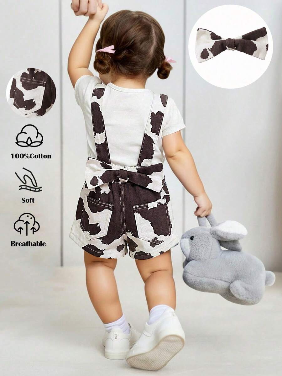 SHEIN Bộ quần yếm denim dáng rộng cho bé gái, họa tiết da bò và nơ lớn trang trí ở eo phía sau. - Màu be - Xem 1