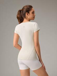 OutZeal Damen Sport T-Shirt Workout Gym Top feuchtigkeitsableitend, butterweich, eng anliegend, mittlere Kompression - Aprikosenfarben - Übersicht 6