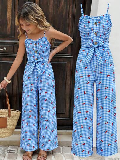 SHEIN Girls' Vintage Floral Print Jumpsuit, Designed To Slim And Elongate The Figure, With A Strapless Top, Ruffle Trim, And Bow Waist Accent, Paired With Wide Leg Pants For A Retro Elegant Look. Suitable For Casual Outings, Dates, And Small Gatherings.