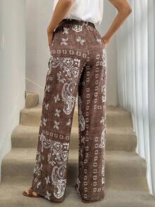 SHEIN Tall CURVE Quần dài ống đứng in họa tiết cỡ lớn dành cho nữ, thích hợp cho kỳ nghỉ, du lịch, lễ hội âm nhạc, trang phục thường ngày, kỳ nghỉ xuân/hè/phong cách bohemian/quần ống rộng bohemian gợi cảm, quần ống rộng nữ, trang phục mùa xuân cho nữ, quần phong cách bohemian, trang phục đi biển lễ Phục sinh, trang phục đi nghỉ mát cho nữ. - Nhiều màu - Xem 2