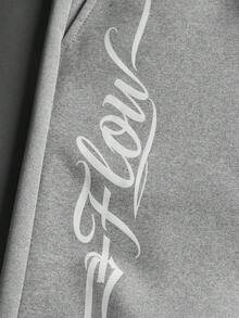 Manfinity Hypemode Men's Casual Street Style One-Piece Sweatpants, Short Knit Sweatpants, Elastic Drawstring Waistband, Street Style, Comfortable And Warm, Simple Slogan - Light Grey - View 5