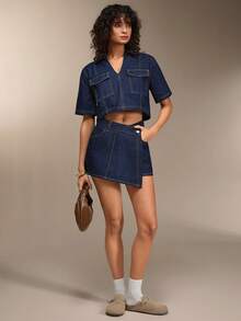 EURMUSE Conjunto casual feminino composto por top cropped de manga curta com bolso utilitário e saia jeans assimétrica. - Lavagem escura - Ver 5
