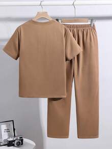 SHEIN 2pcs/Set Tween Boys' Brown Summer Casual City Break College Style Big Letter Embossed Graphic Round Neck Short Sleeve T-Shirt And Pants Sports Set - Coffee Brown - View 2