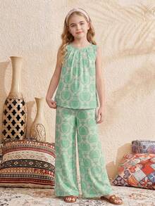 SHEIN Bộ đồ đi nghỉ mát 2 món cho bé gái tuổi teen: áo không tay cổ tròn dáng rộng màu hồng in hoa và quần ống rộng. - Nhiều màu - Xem 7