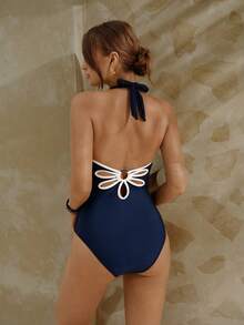 Swim Chiccia بدلة سباحة نسائية قطعة واحدة باللون الأزرق الداكن والأبيض مع طبعات زهرية وتصميم مفرغ، صيفية - أزرق بحري - مشاهدة 3
