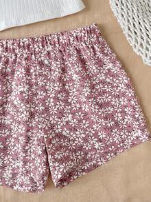 SHEIN Bộ 2 món cho bé gái tuổi teen: áo vest cổ chéo sọc màu trơn và chân váy bánh kem cạp cao họa tiết hoa, phong cách dễ thương độc đáo, phù hợp đi du lịch, lễ hội âm nhạc, tựu trường, tiệc trưa và trà chiều sân vườn mùa xuân - Nhiều màu - Xem 3