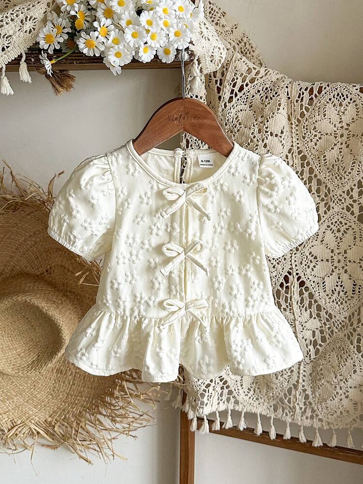 SHEIN Vintaside Kids Baby Girls' Blouse With Unique Floral Fabric Texture, Countryside Vacation Style, Cute And Fashionable, Comfortable For Spring And Summer, Bow Decor - Apricot - View 3
