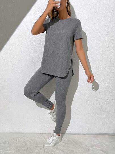 SHEIN Essnce Setelan 2 Potong Wanita Kasual Olahraga Sehari-hari, Kaos Lengan Pendek Warna Polos Sederhana dengan Belahan di Bagian Bawah dan Legging, Musim Semi/Panas, Pakaian Musim Panas untuk Wanita